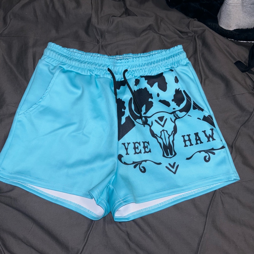 Super cute turquoise YeeHaw shorts. Size medium